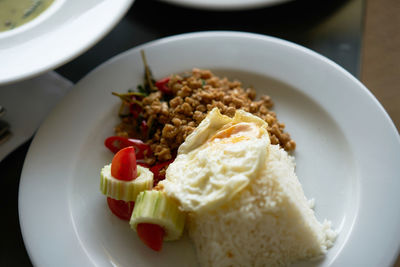 Close-up of thailand pork stir fried basil served on plate