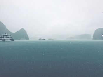 Scenic view of sea against sky during rainy season