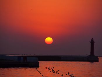 Scenic view of sea at sunset