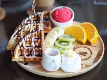 Close-up of breakfast served on table