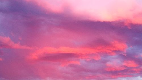 Low angle view of clouds in sky during sunset