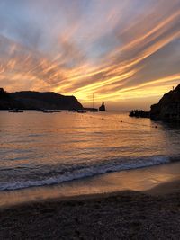 Scenic view of sea against sky during sunset