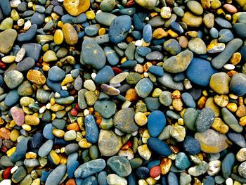 High angle view of stones on pebbles