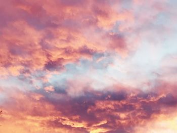 Low angle view of clouds in sky during sunset