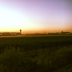 Surface level of agricultural field against clear sky