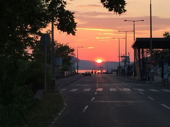 Empty road at sunset