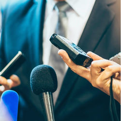 Close-up of man using mobile phone