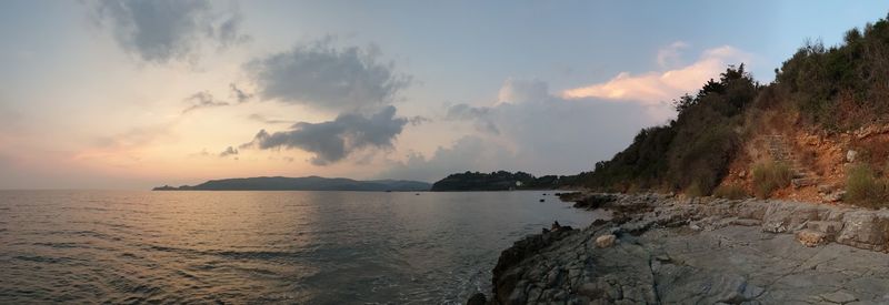 Panoramic view of sea against sky during sunset