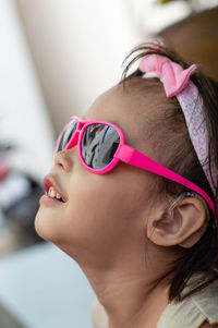 Close-up of girl wearing sunglasses