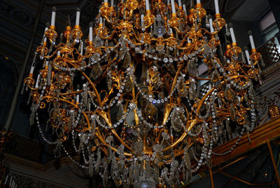 Low angle view of illuminated chandelier