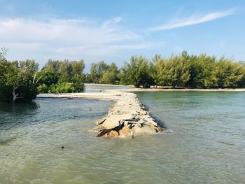 Scenic view of river against sky