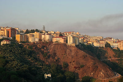 High angle view of buildings in city against clear sky