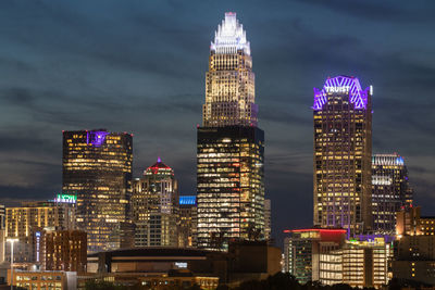 Illuminated buildings in city at night