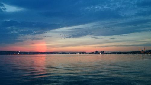 Scenic view of sea at sunset