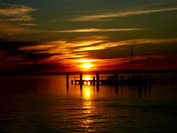 View of calm sea at sunset