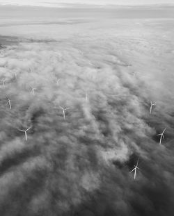 Aerial view of airplane flying in sky