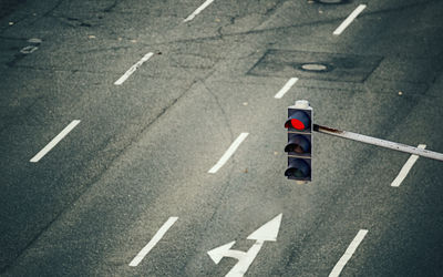 High angle view of traffic sign on city street