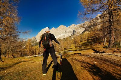 Autumn hiking at its best full length of man standing on mountain