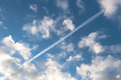 Low angle view of vapor trail in sky