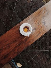 High angle view of coffee cup on table