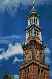 Low angle view of clock tower against sky