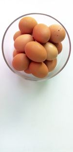 High angle view of eggs in bowl on table