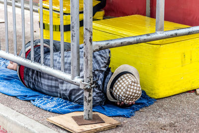 Street vendor sleeping on the street after carnival night in the city of salvador in bahia.