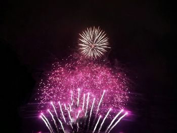 Firework display at night