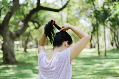 Rear view of woman in park