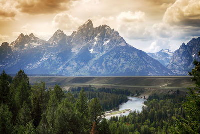 Scenic view of snowcapped mountains against sky