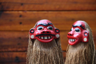 Close-up of carving and painting on wood