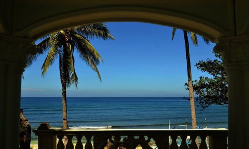 Scenic view of sea against blue sky