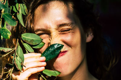 Close-up portrait of woman holding ice cream