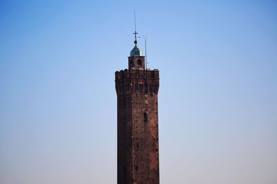 Low angle view of building against clear blue sky