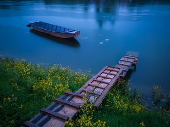 High angle view of boat moored on lake