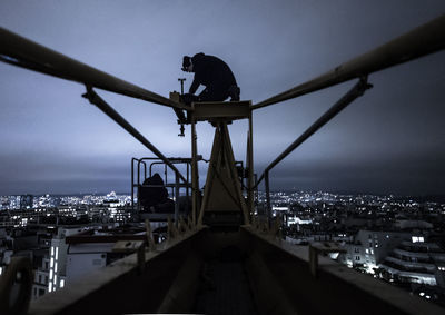 View of illuminated city at waterfront