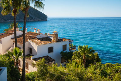 Houses in front of the mediterranean sea, on a sunny morning