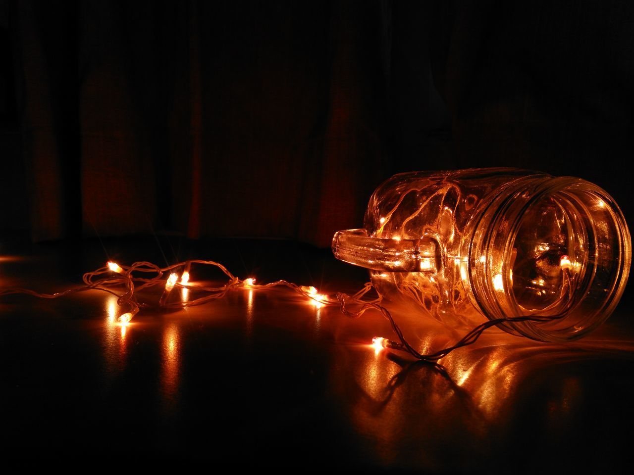 CLOSE-UP OF ILLUMINATED LIGHT PAINTING