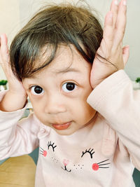 Close-up portrait of cute girl