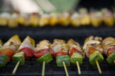 Close-up of meat and vegetables on barbecue grill