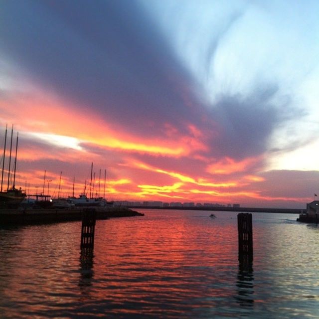 water, sunset, sky, sea, waterfront, tranquil scene, tranquility, scenics, beauty in nature, nautical vessel, orange color, cloud - sky, boat, transportation, nature, idyllic, rippled, horizon over water, cloud, reflection