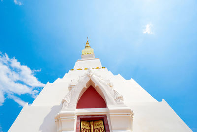 Low angle view of building against blue sky