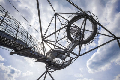 Low angle view of metallic structure against sky