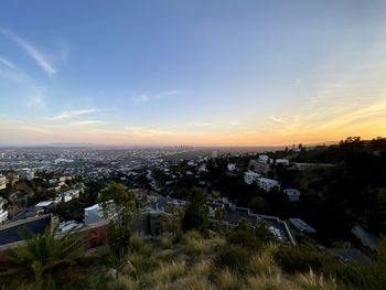 High angle view of townscape against sky at sunset