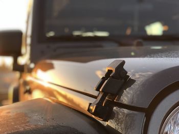 Close-up of car against sky