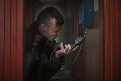 Young man using mobile phone