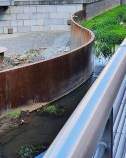 High angle view of swimming pool by wall