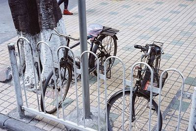 Bicycle parked in front of wall