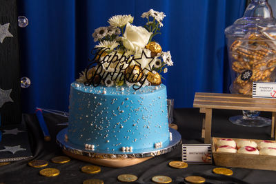 Close-up of cake served on table