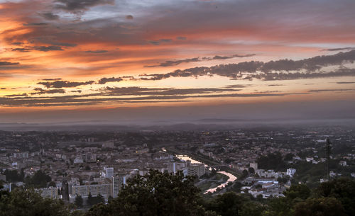 High angle view of townscape against sky during sunset